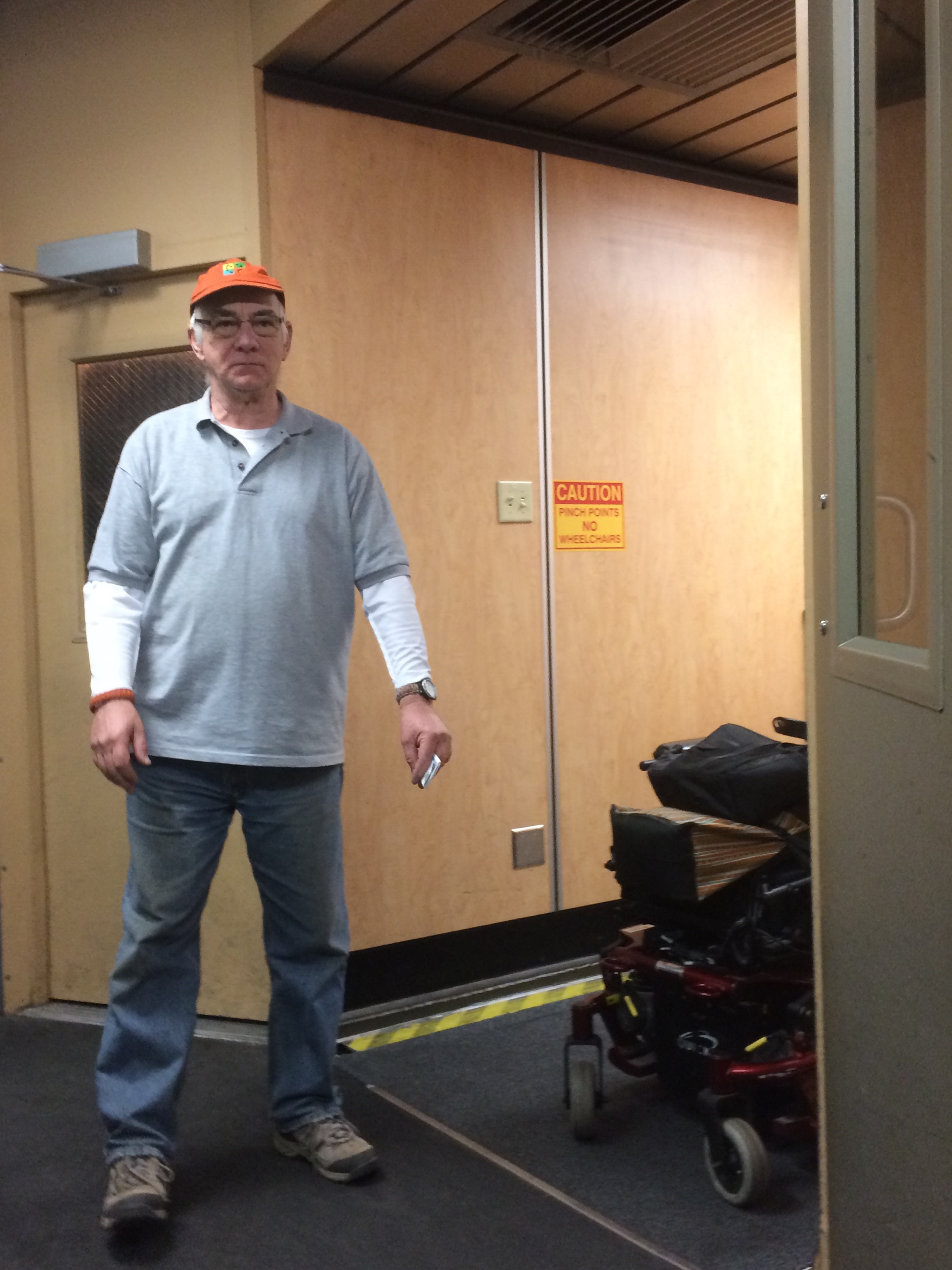 Ian, waiting with my power chair