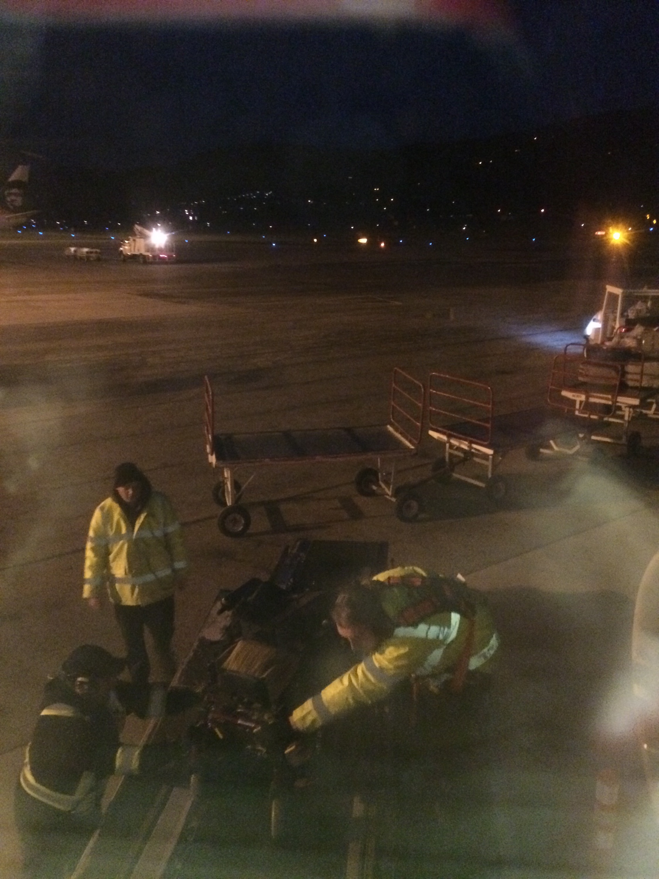 My chair being manhandled onto the plane
