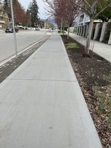 The smooth bike line that’s part of the sidewalk