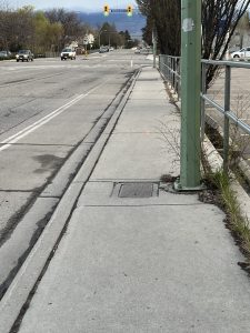 Lamp post in a narrow sidewalk